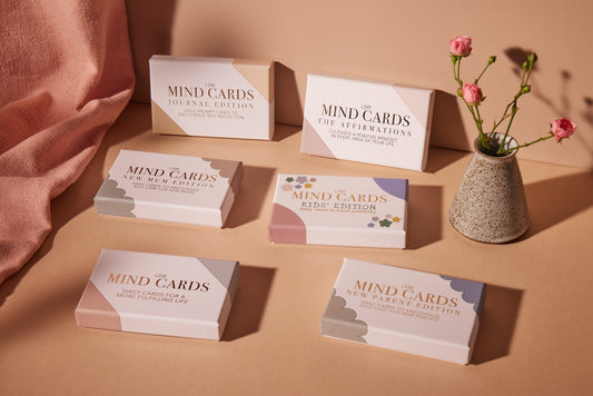 New mum using mindfulness cards for emotional wellbeing and daily self-care