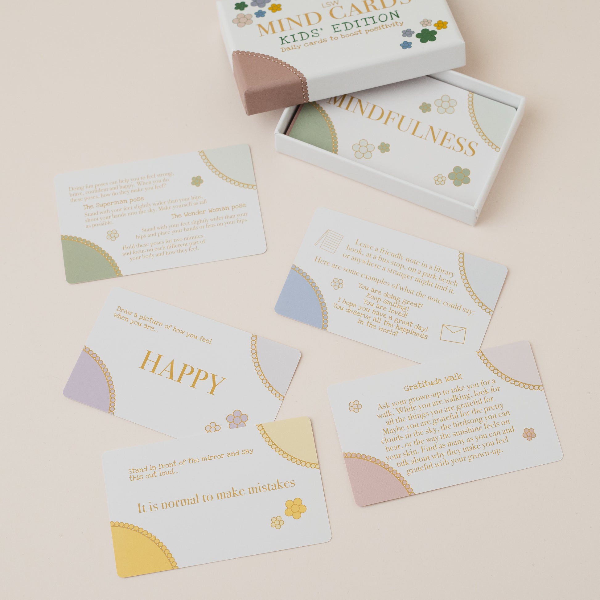 Mindfulness cards with a box labeled 'Mindfulness Kids Edition' on a beige background