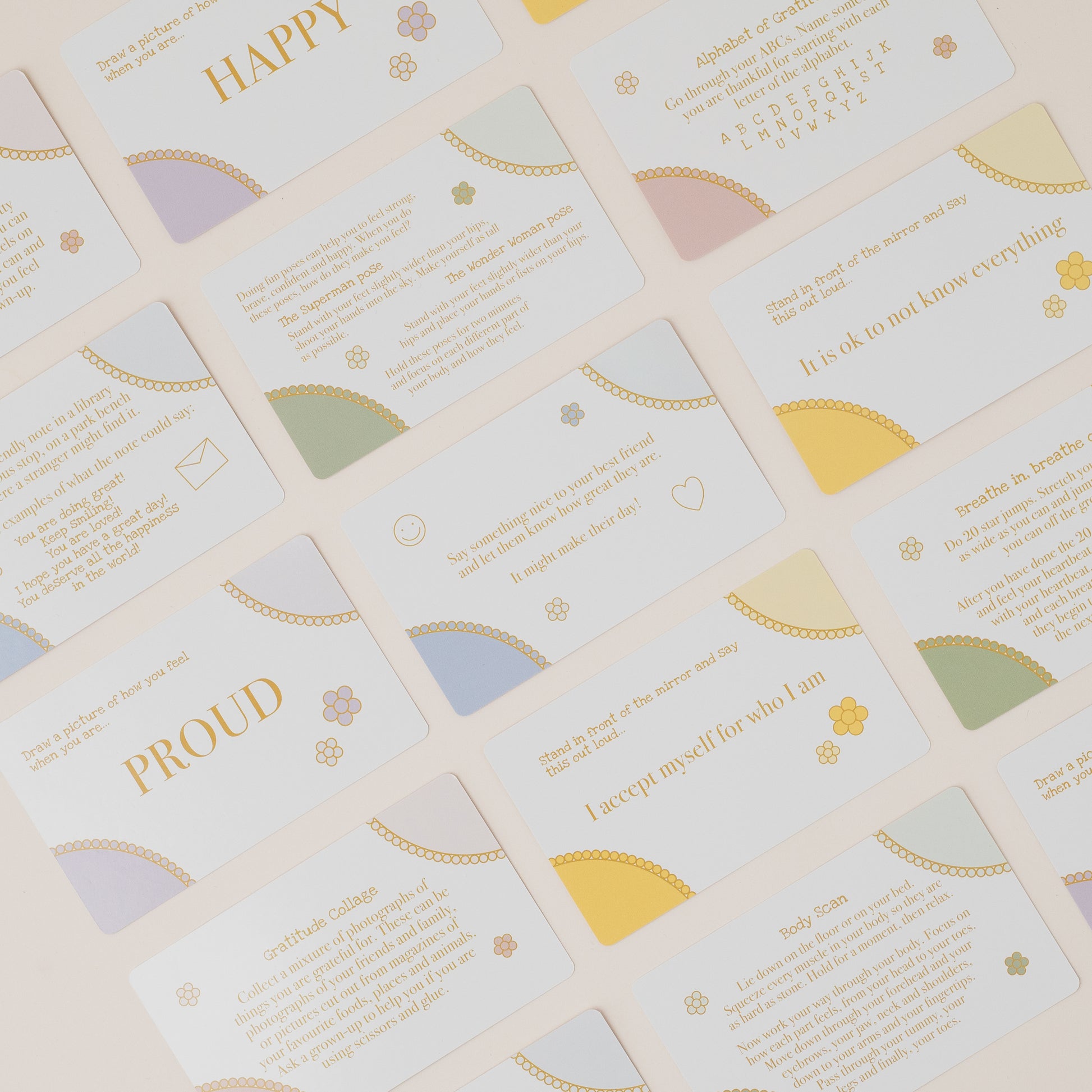Grid of motivational cards with text and colorful half-circle designs on a light background