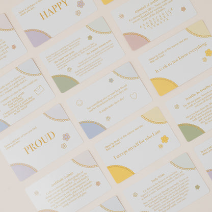 Grid of motivational cards with text and colorful half-circle designs on a light background